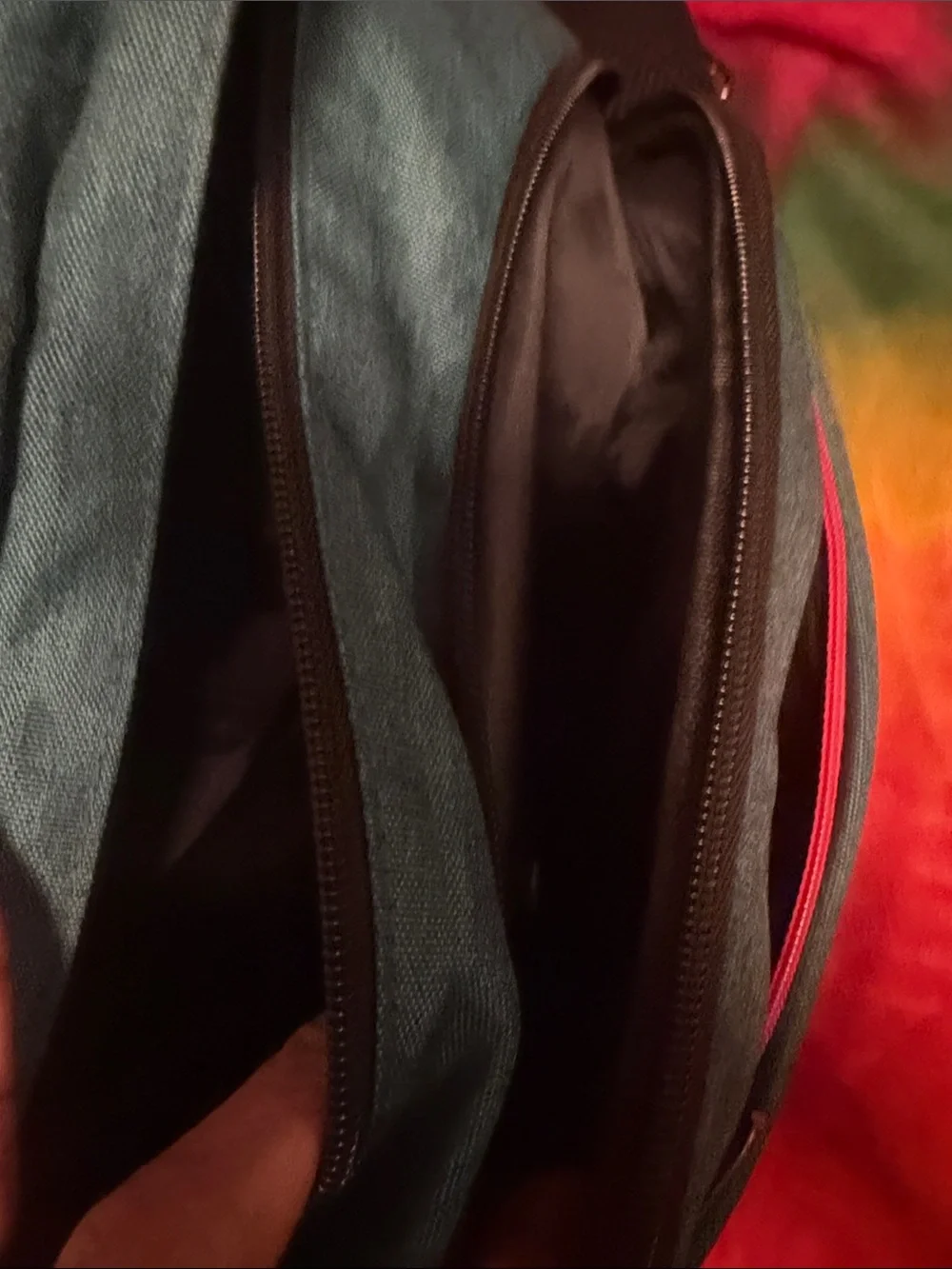 Teal Sling Backpack with Red Accent